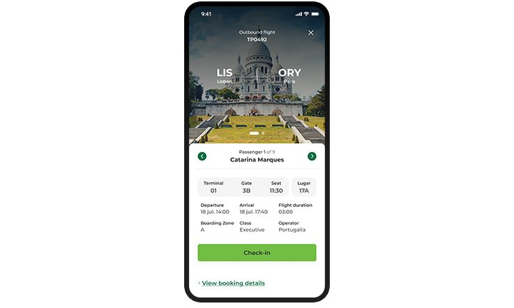 Picture of a mobile phone screen. In the upper section, a picture of a building on top of a hill, overlapped by the indication of a Lisbon-Orly flight. Below there's information about the booking, followed by a green button that reads "check-in", while in the lower left corner there's a green link saying "See booking details".